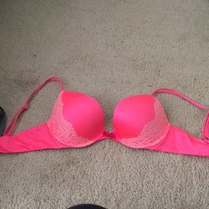 Pink and lace Victoria secret push up bra.